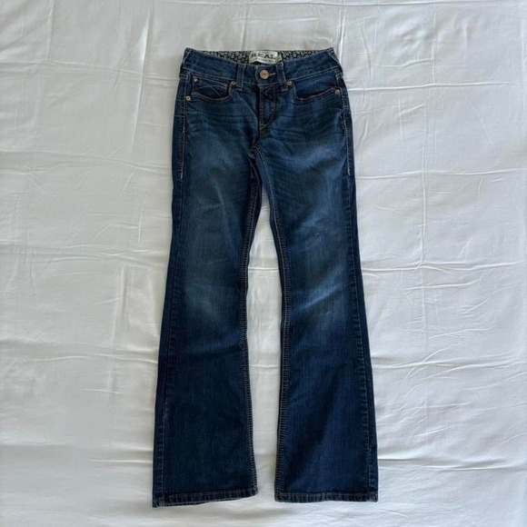 Ariat Denim - Ariat R.E.A.L. Denim Blue Bootcut jeans with black and white paisley interior